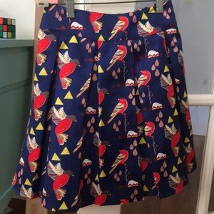 Blue bird pleated mini skirt